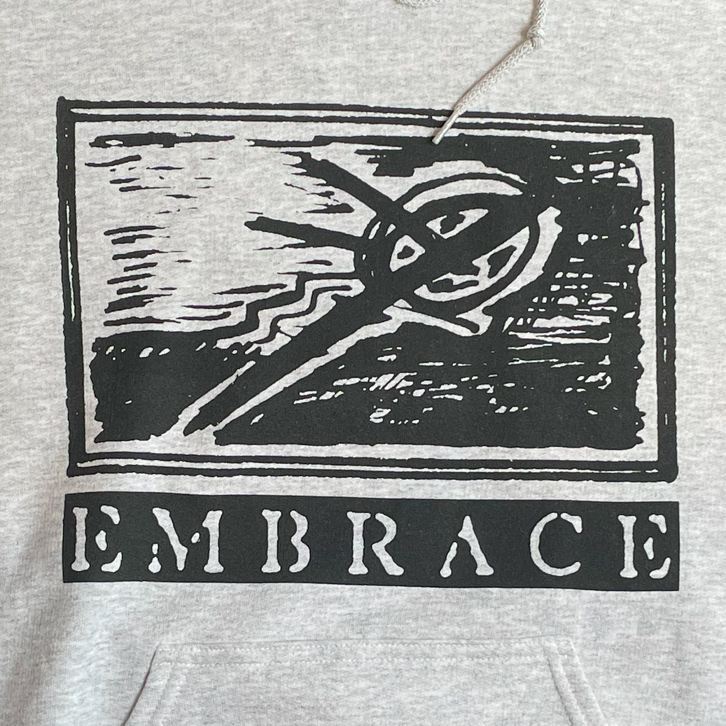 EMBRACE パーカー