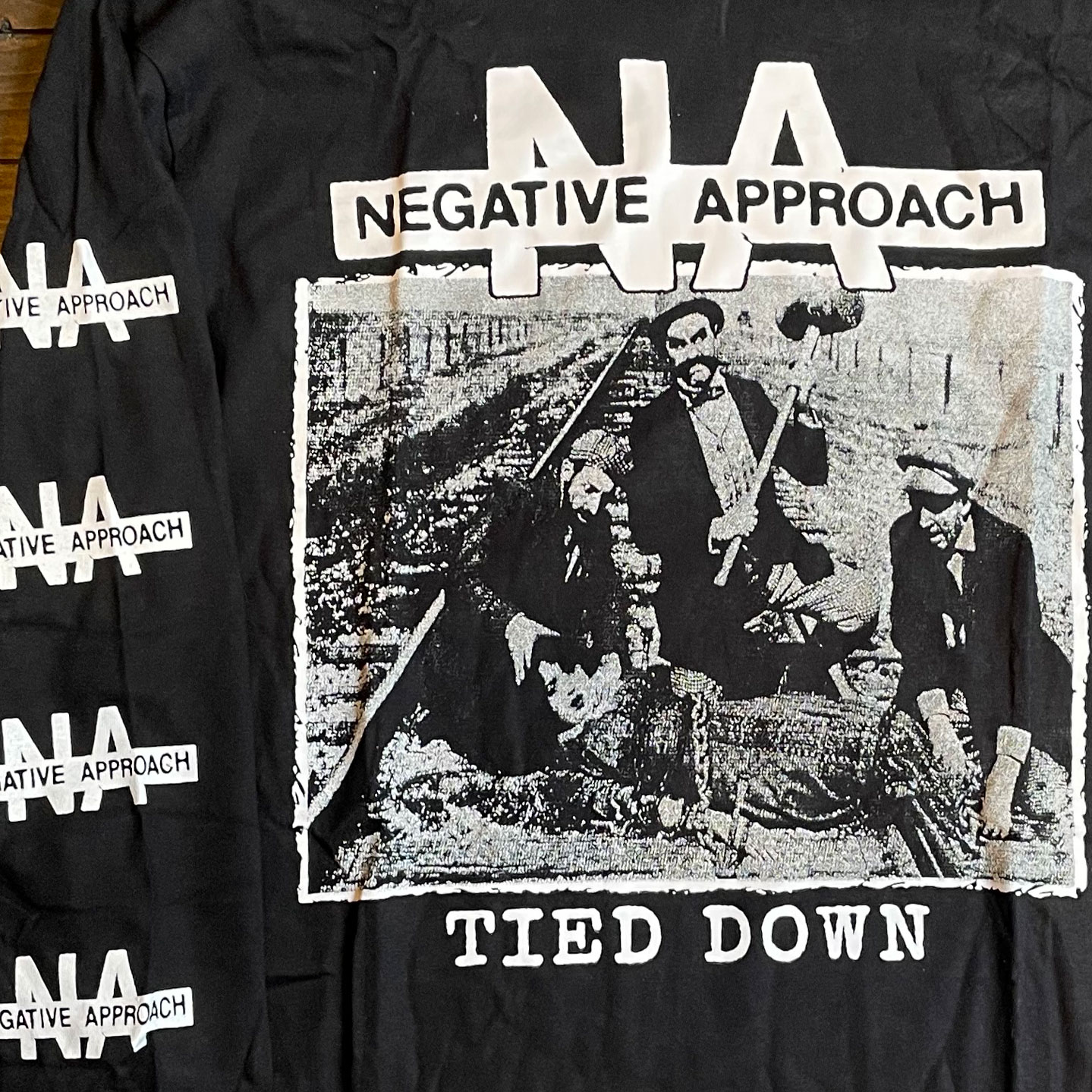 NEGATIVE APPROACH ロングスリーブTシャツ TIED DOWN